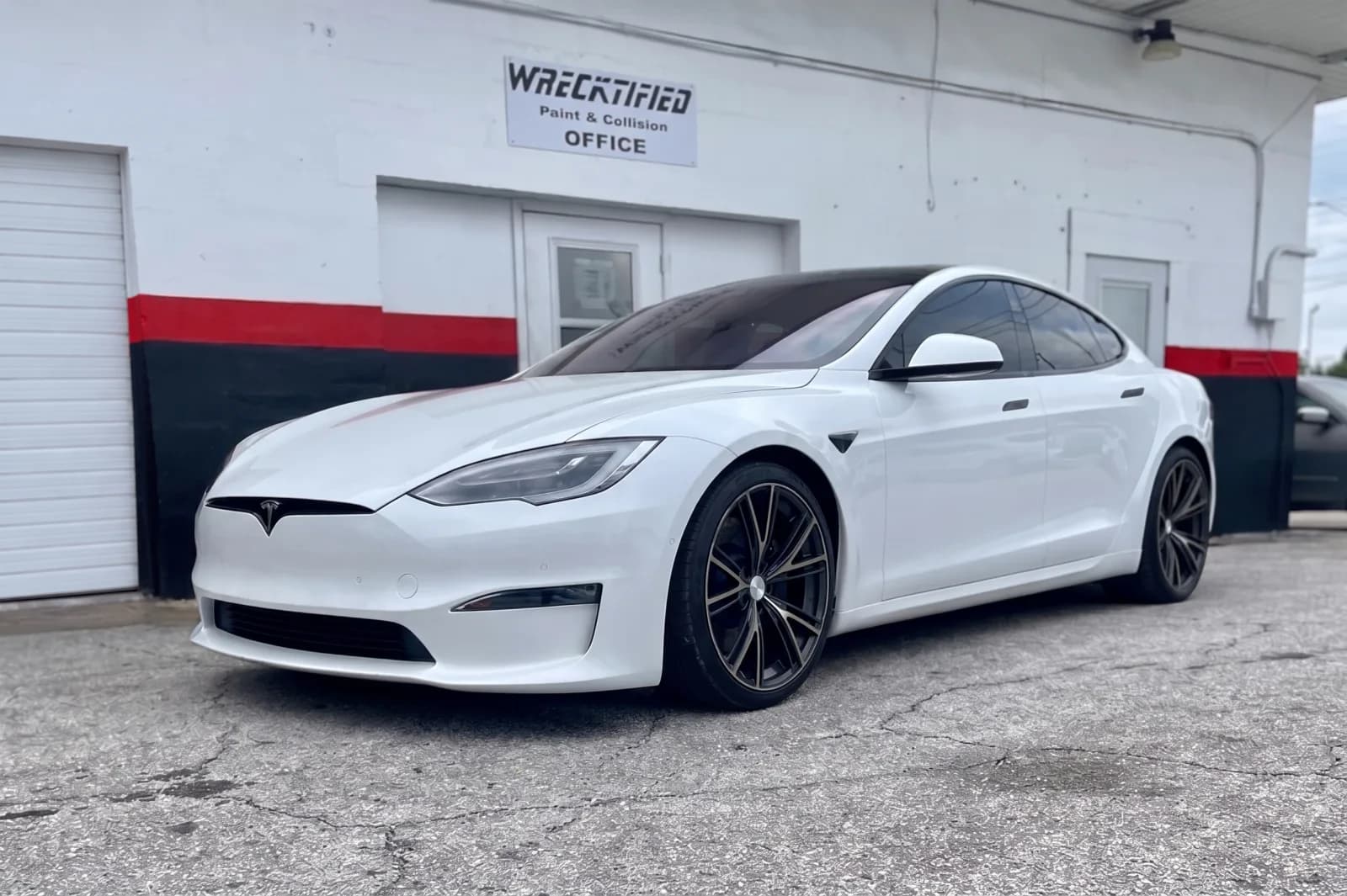 White Tesla Model S fully repaired and repainted to a flawless finish at Wrecktified