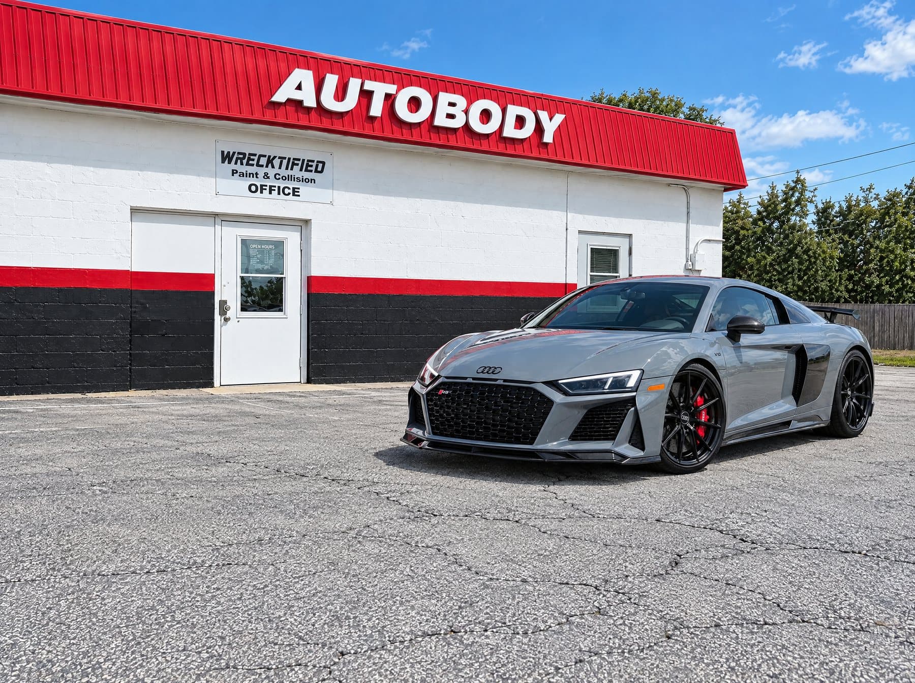 An Audi R8 parked at Wrecktified Paint & Collision in Clearwater, FL