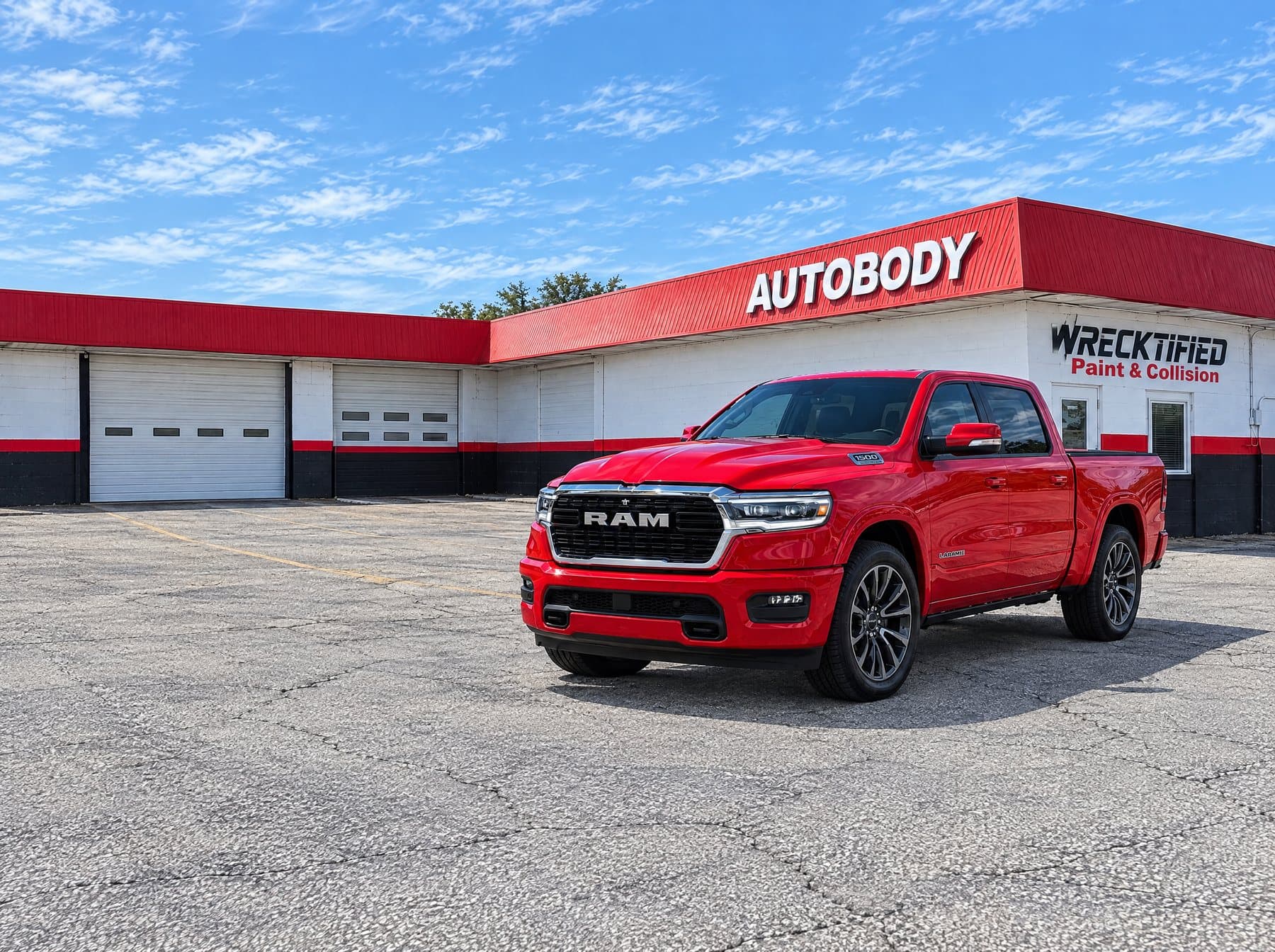 A Ram 1500 pickup parked at Wrecktified Paint & Collision in Clearwater, FL